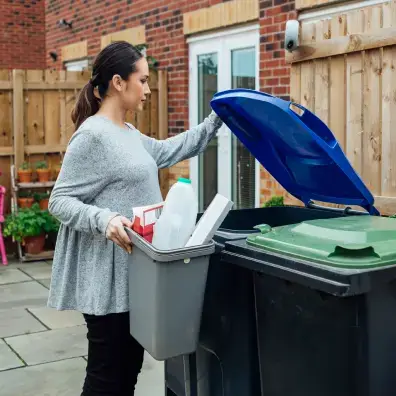 Woman Recycling